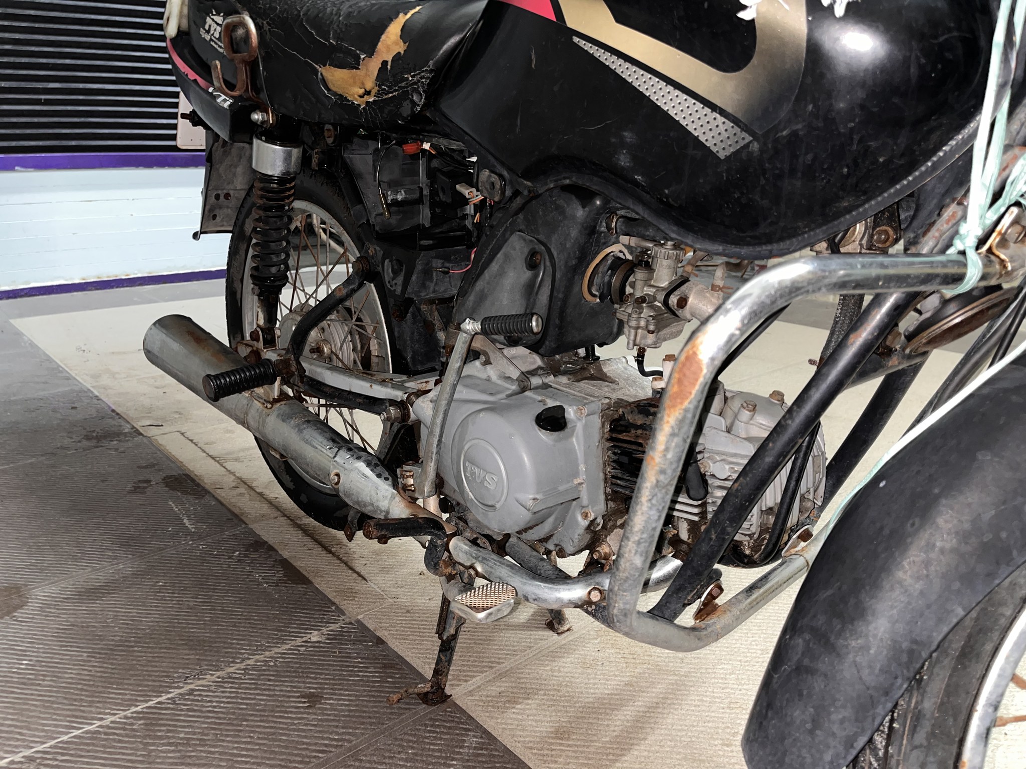 Father's Centra lower side, torn panel and engine