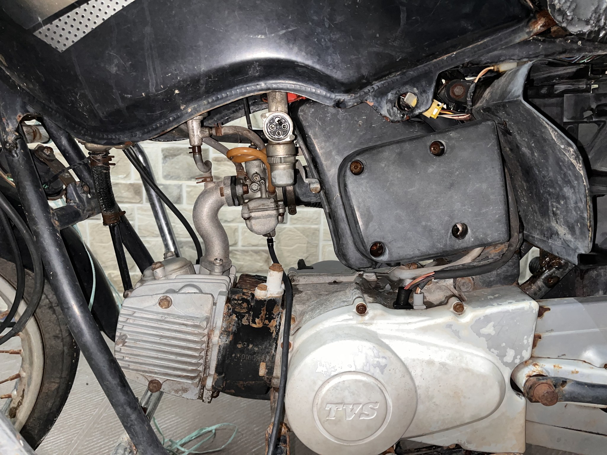 Rusted TVS engine and carburettor bay