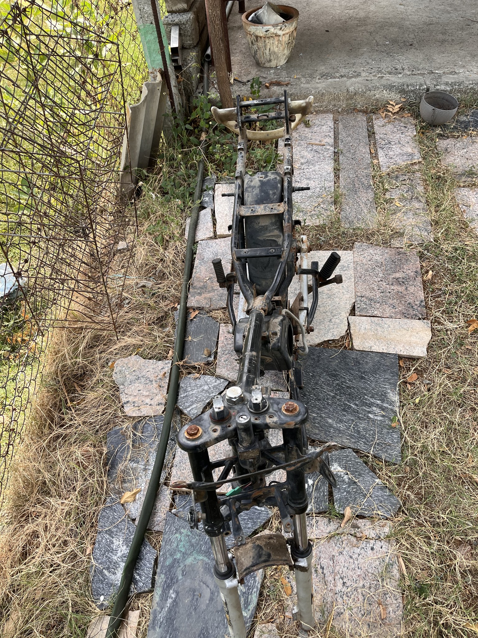 Stripped Centra frame with forks during teardown