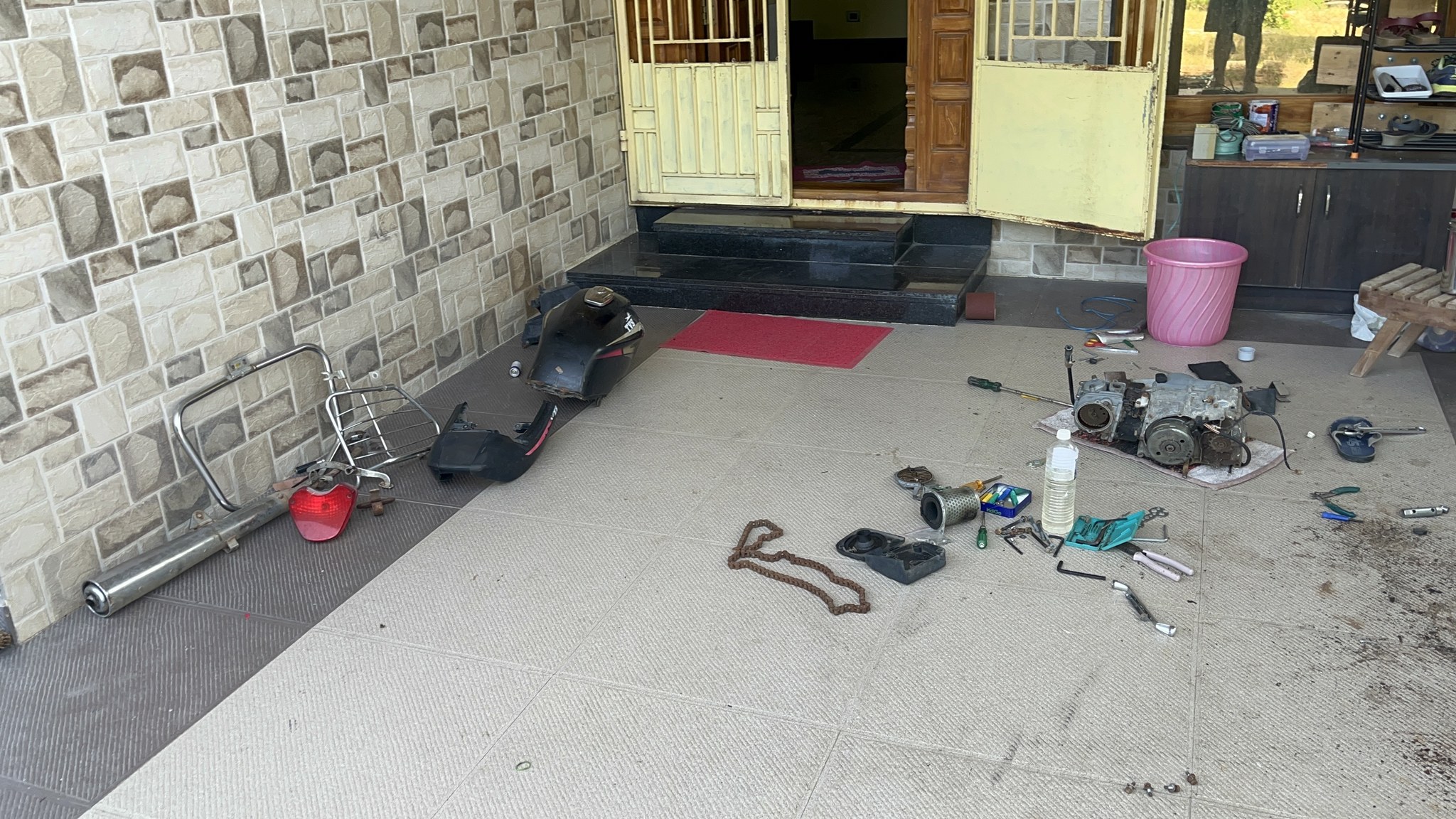 Removed silencer, tail lamp and rear parts on floor
